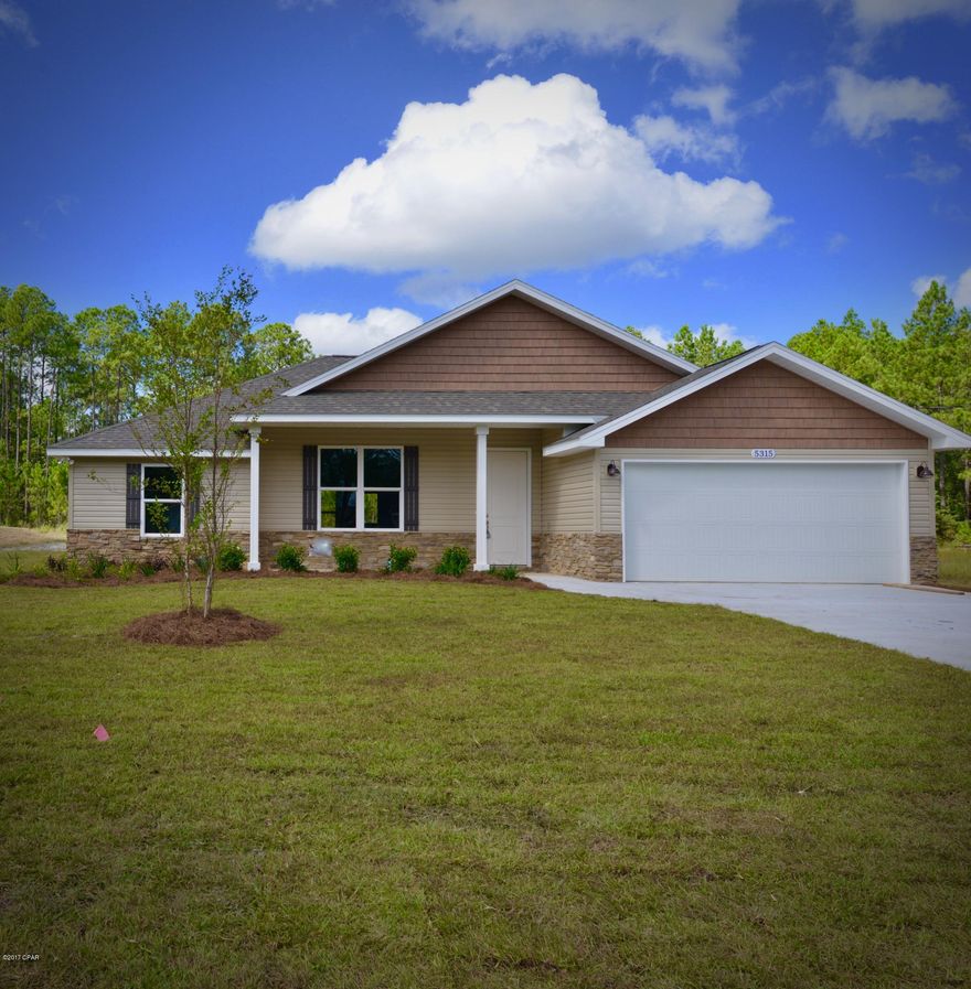 If you are looking for a home on a very large lot, look no more. This beautiful new home with open floor plan sits on 1+ acre of land. Kitchen features upgraded stainless steel appliances, pantry, breakfast bar with overhead pendant lights and granite countertops. Large master suite with tray ceiling and walk in closet. Double vanity with granite in master bath. Luxury solid vinyl plank flooring in all common areas and carpet in bedrooms. A separate home office with built in desk with granite counter top and open shelving. Exterior has stone and cedar shake accents, covered front and back porch, brand new well, septic, drain field and Irrigation system. Earth Cents Home with Gulf Power. 1-year Builder Warranty. Survey provided. Don't miss the chance to call this home YOURS.