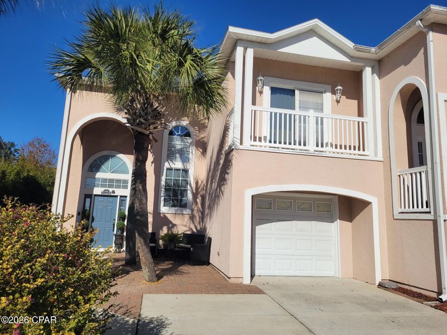 Welcome Home! Spacious end unit Townhome close To Everything! Walking distance to the Beach, Capt. Andersons, Schooners, St. Park, Shopping, Fishing, Pontoon Rentals & Marinas. Features Include: Beautiful view of the lagoon from private master balcony, secluded open deck off of 2nd and 3rd bedrooms, Large Screened In Patio, breakfast bar & added Loft Area not available in other units that is large enough for an office or gaming area! Finished, Oversized One-Car Garage, HVAC 5~yrs new. New flooring upstairs. Newer SS appliances. Roof 2019. Double parking unique to only a few units. Buyers/Rep. to Verify All Information Deemed Important