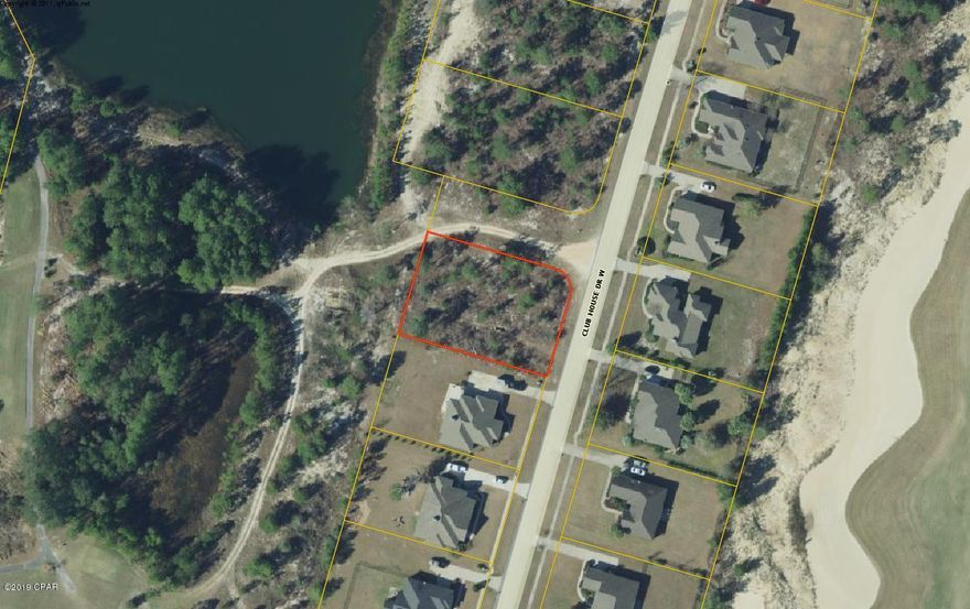 Corner lot backing up to the golf course in Windswept Dunes.  Beautiful community with large lot sizes.  Flood Zone X.  Lot is high and dry.