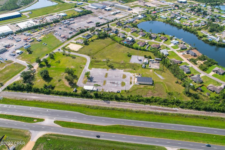 Rare opportunity to purchase 10.350 acres of prime real estate in the heart of Bayou George Drive! This large mass of land is zoned 

R-1 & boasts of potential for builders and contractors. This highly desirable location has 1,100 feet of road frontage, which is huge for marketing and advertising. This location also has 3 buildings on site, as well as a fully paved parking lot, and a Cell Tower that produces $915.07 a month.



Call today to view this one of a kind property.