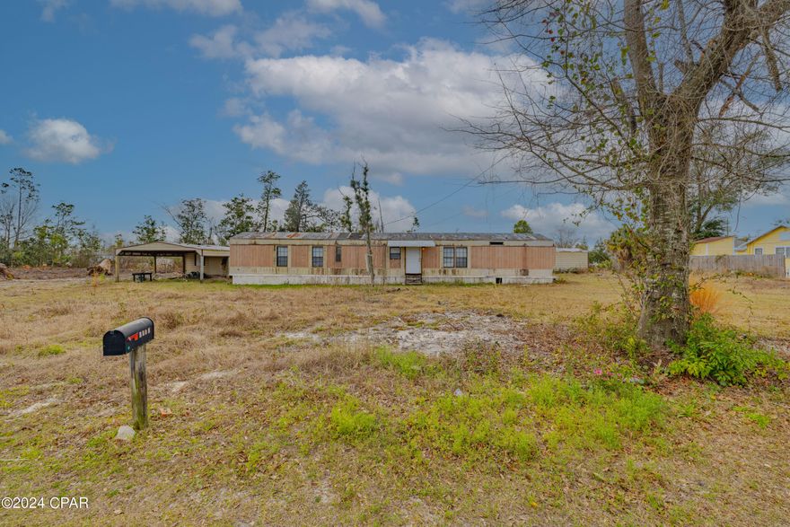 Attention Developers!

'CURRENTLY UNDER CONTRACT, SELLER ACCEPTING BACKUP OFFERS'  Welcome to a rare investment opportunity in the heart of Parker less than 5 miles from Tyndall Air Force Base and close to local amenities! 
This large cleared lot which is high and dry offers the unique advantage of being subdividable into four separate parcels, setting the stage for diverse development opportunities. This property provides ample room for the construction of four distinct residences offering a great return on investment. 
Featuring a mobile home ripe for renovations as well as 3 large sheds with the freedom to maneuver the mobile home to any desired location on the property. According to the City of Parker, it's possible to replace the current manufactured home with a new one within six months after it's removed. Whether you choose to refurbish the existing structure or explore new development avenues, the options are limitless.
With its prime location and unparalleled potential, this won't stay on the market for long. Schedule your showing today and unlock the boundless opportunities that await!