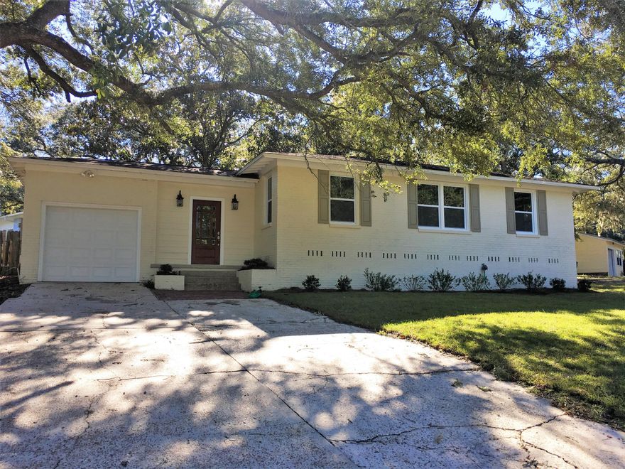 IF YOU ARE A FIRST-TIME HOMEBUYER, INVESTOR, OR LOOKING TO DOWNSIZE, YOU NEED TO LOOK AT THIS NEWLY REMODELED HOME IN THE COVE. This 3 bedroom, 1 bath Southern Charmer is nestled among the majestic oaks, situated on a corner lot, and a definite MUST SEE! Quaint foyer entry with French Doors that lead out to a covered patio suitable for enjoying your morning coffee or just relaxing after work. The home boast new Stainless Appliances, beautiful Hardwood & Tile Floors, Ceiling Fans for your comfort, and Single Car Garage with Laundry Area! Everything here is in tip top shape! The Curb Appeal is SUPERIOR! Great location, across the street from the water and park, close to boat ramp, convenient to doctors, hospitals, shopping and more. All sizes, ages and measurements are approximate; buyer to verify if important.