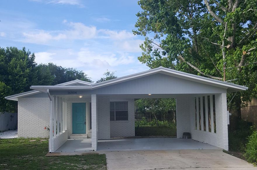 COME CHECK OUT THIS RENOVATED BEACH HOUSE TODAY SOUTH OF 98! Open Floor Plan that is MOVE IN READY with NO HOA FEES!  Home has been renovated to include New Roof, HVAC, Water Heater, Freshly Painted inside and out, Tile Floors throughout (NO Carpet), New Granite Counter Tops, New bathroom vanities, New Range, Vent Hood, Gold Series Dishwasher, New Light Fixtures, and much more!!!  Just West of Pier Park (less than 1 mile, also access through Park) and a short walk/golf cart ride to the White Sandy Beaches!