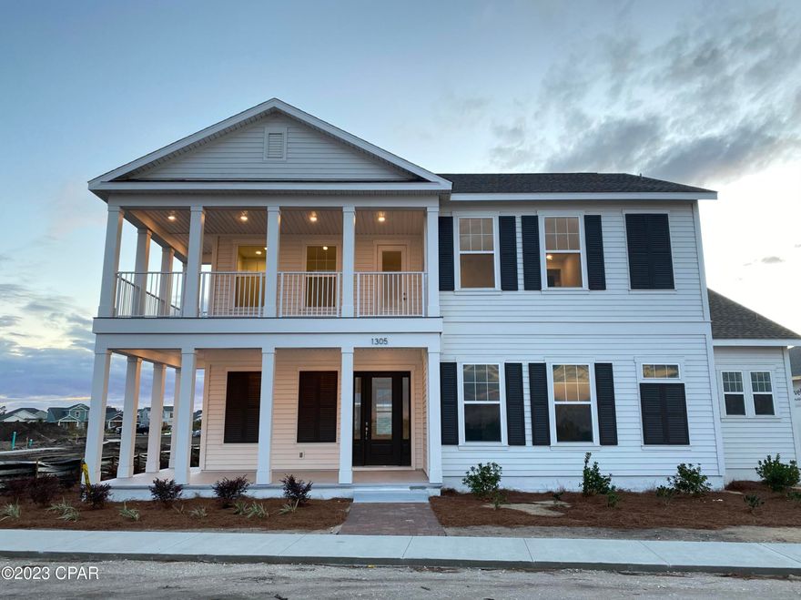 The St. George plan in SweetBay has 5 BR plus loft in the main home and an additional 1 BR apartment in the carriage house. This home features open living area, 8-foot doors, LVP throughout the main living areas and plenty of windows for natural light. The large eat-in island kitchen features stainless appliances with a 5-burner gas range, large pantry and tile back splash. The downstairs owner's suite has a tray ceiling, large walk-in closet and spa bath with tile-to-ceiling shower and dual vanity. SweetBay is a walkable and golf-cart friendly community with unrivaled amenities: dock with Bay / Gulf access for kayaking, private beach, paddle boarding, and fishing, parks, junior olympic resort pools, sports court, miles of trails, and future amenities including a Publix-anchored town center and marina! New home buyers even get priority access to top-rated University Academy!