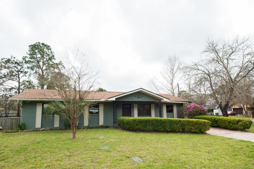 REDUCED $15,000! Do you want to live in Lynn Haven?  Do you need a lot of room?  This is the house for you!  This massive all-electric home is in a wonderful location, walking distance to Mowat Middle School and just around the corner from Winn Dixie and Super Wal-Mart! It sits on a nice fenced corner lot with an abundance of parking...one space in front, four spaces on the side, plus a 19x19 detached garage!  It has a big kitchen with loads of counter and cabinet space. Most of the floors are ceramic tile, with beautiful wood-look vinyl plank in the bedrooms and rec room.  The floor plan features 4 bedrooms and 2 baths, a living room, a den featuring a wood burning fireplace and a vaulted ceiling with skylights, and a large 22x19 rec room. Plenty of room for a pool table! There is also large tiled screened porch overlooking the spacious back yard.  The house had fresh interior paint, and the exterior was painting within the last 2 years.  So if you have a big family, like to entertain, or just want a lot of room to stretch out in, you can't beat this value!