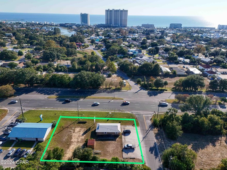 Rare opportunity to purchase 4 corner lots on Panama City Beach Parkway near Pier Park. Boasting an annual average daily traffic count of 46,000 (per FDOT) this property offers high visibility and many avenues to maximize value. Totaling just under 1/2 acre the property features an office building and ample room for a laydown yard etc if desired. Zoned commercial high density (PCB) and located near the entrance of Frank Brown sports complex. Property is currently leased until July 2028- collect income while you plan your next venture.