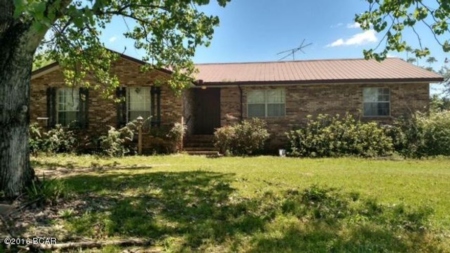 Nice country home nestled on 1.4 +/- acres. Property features 2057 sq.ft. 3BR/2B home, LARGE 32 x 48 pole barn, and older single wide mobile home no value (((used as storage) 2 septic systems. Other features of the home are; large brick wood burning fireplace to warm any cool night, screened in back porch, a spacious kitchen with a large pantry for storage. There is plenty of room for a garden or outside entertaining.