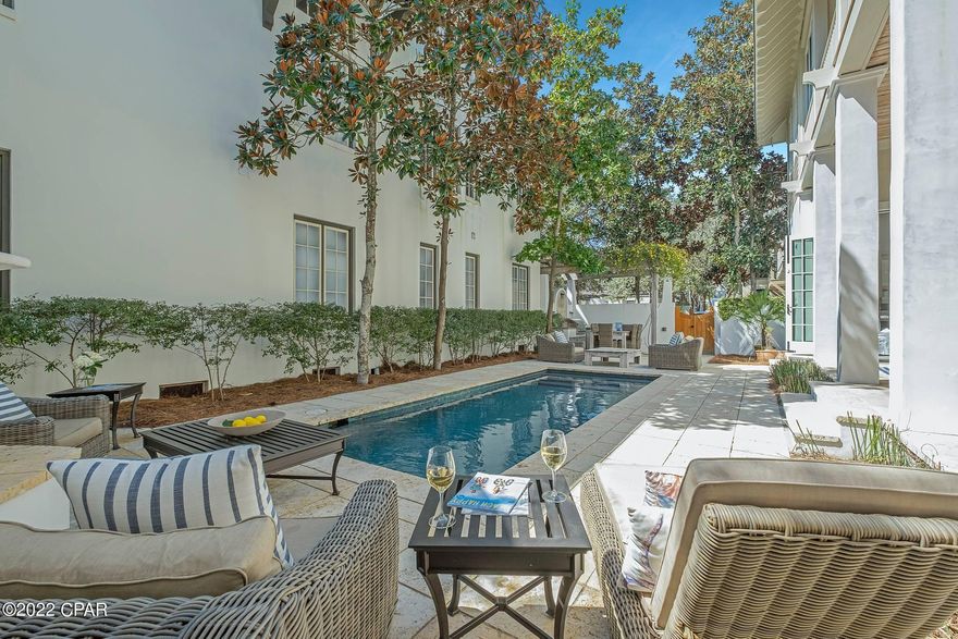 Step into one of Rosemary's largest outdoor yard living spaces, a serene sanctuary. Located on the coveted side of 30a with easy beach access. This Rosemary Beach home with a pool and carriage house is designed to entertain. The living, dining and outdoor porch includes two fireplaces and eating areas that flow as one gracious space. Soft palettes of blues, greens, and sand colored décor by Pizitz of Seaside. Craftsmanship abounds with old Florida pecky cypress beams and 100 year sinker cypress custom cabinets, as well as all new white oak beach washed flooring. The home has been completely remodeled and features beautifully tiled bathrooms and new cabinetry. Start with a perfect kitchen inside where the meal completes with outdoor grilling under the vine covered pergola. Such a heavenly house for kid's play with two upstairs porches for painting, napping and reading when not swimming in the heated and lighted pool. Both the young and adult kids will love to take a private night swim and make smores in the wood fireplace. The outdoor sound speakers (grandfathered in by RB) adds the perfect ambiance for memorable gatherings day or night. This "Casa Spiaggia" is ready for a new family to unpack their bags and settle into the simple art of living at the beach. Located in close proximity to the Town Square, all of your dining and shopping needs are just a short walk. This home is professionally decorated with custom furniture living room pieces, and the home was decorated by Pizitz, Seaside. The property is Artfully managed by 30A Luxury Vacations - 2021 Net Annual Income for main and carriage house: $220,000, which was only for 16 weeks due to many owner days taken up. This property will perform extremely lucrative on a rental program. Don't miss out on this opportunity to purchase one of the only well priced available homes in Rosemary Beach on the South Side. You won't want to miss out on viewing this exquisite home!
