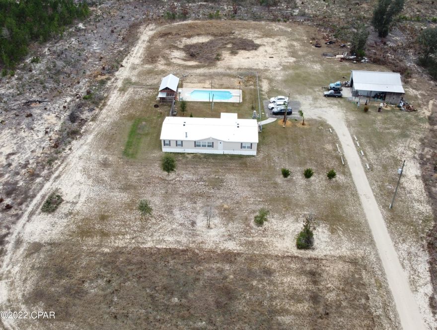 This 3/2 home has it all. With its quaint country 10 acres of charm, it has an abundance of space. This home offers open concept living, nice sized kitchen, dining area, and spacious bedrooms. The kitchen has a nice sized pantry and breakfast bar. A fenced portion of the back yard encompasses a great entertainment area with the 18X36 pool and 12x24 pool house. There is an 24x36 enclosed pole barn, with a 12x36 lean to.  The pole barn has 220 as well as its own separate electric meter. New roof and A/C installed in 2019. Only 5 minutes from the Bristol, 8 minutes to Hosford, 45 minutes to Tallahassee, 1hr to Carrabelle, and 1hr to Panama City, this gem is never too far from town or a day at the beach.