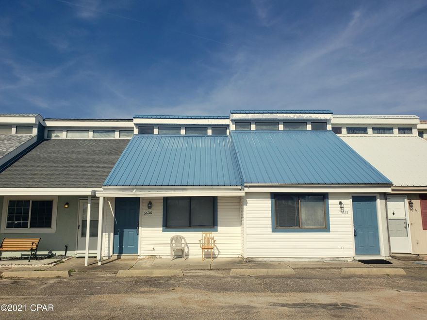 Across the Street From the Beach!!  No HOA and the Rent is On The Way!! $150-$180 nightly!!! Great Price...Great Location down the street from Schooners and other Beach Attractions. Good Condition 2 Bed / 1.5 Bath w/ Screen-In Porch Area. Nice size Living Room, Kitchen, & Dining Area. Washer & Dryer. Inside & Outside Storage Closets. Perfect for Income Producing or a Vacation Get-a-Way. The market is Active....don't miss out!!!!