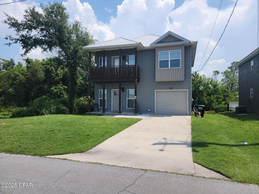 Beautiful 4 Bedroom 2.5 Bath custom built home with single car garage.   This two-story home offers a nice open floor plan. As you enter, you're welcomed into a bright living room that flows seamlessly into the kitchen and dining areas. The kitchen features custom cabinets, island bar with quartz countertops, stainless steel appliances, and a pantry-storage closet.  Just off the dining area is the laundry room, as well as a half bath. Vinyl Plank flooring downstairs and carpet in the bedrooms. The master bedroom suite is very spacious and has a tray ceiling.  It has French doors leading to a balcony. Master bath features double vanity, shower/tub combo, and a generous walk-in closet.  You'll also find three additional bedrooms—perfect for family, guests, or your own home office setup. There is a nice front loading washer & dryer that will stay.  Pets are subject to approval by the owner and will require a pet deposit. This lovely home with a lot of custom features and upgrades. It is convenient to shopping, schools, Tyndall AFB or the Navy Station, beaches, restaurants, and much more. Call to schedule a tour today!