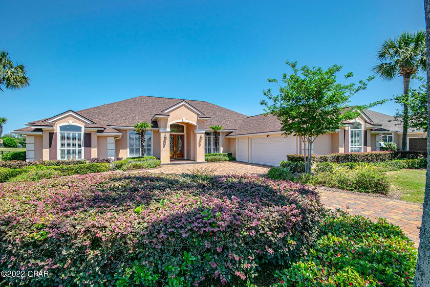 HOME SOLD AS IS...Beautiful Open and Spacious Ranch over looking the Beautiful #8 hole Jack Nicklaus golf course and small pond. This lovely home with plantation shutters throughout is set up for family gatherings with its open kitchen, breakfast room and family room overlooking the magnificent screened in pool area with plenty of patio space.  The entry foyer and sitting room boost 14 foot ceilings other room ceilings boost 12 foot ceilings which add to the exquisite ambience of this home. If you love built-ins there are plenty.  The French Door Entry magnificent master bedroom suite has a door that leads to pool area.  The vaulted master bath is one to see.  The fourth bedroom is currently being used as an office.  The main full bath also has a door leading to pool area for added convenience.  2 Car Garage with added 1  Golf cart entry garage & storage room. Come and See