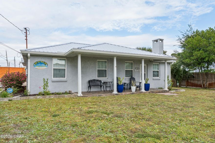 Welcome to your Beachside Paradise in the highly sought after community of Bid-A-Wee Beach! Discover the charm of this beautifully renovated 3-bedroom, 2-bath cottage, located just 100 steps from the private, gated Bid-A-Wee Beach. With five exclusive beach access points, this home offers the perfect blend of coastal living and modern convenience. Completely Renovated: This home boasts updated features and brand new metal roof (2025). Move-in ready and designed for peace of mind! Spacious Lot: Situated on a generous 75' x 100' lot, the property offers endless possibilities. Add a carriage house, or even a pool - the choice is yours!  Large fenced-in yard that includes a spacious storage building and a private backyard oasis. Fully furnished and rental-ready, This Coastal Cottage is perfect for weekly rentals or as your personal beach retreat. Start your mornings with coffee on the front porch smelling all of the flowers and end your evenings watching breathtaking sunsets. Prime Location: •Pier Park, Top Golf, and Dolly Parton's Pirate Adventure: Less than 2 miles away •Scenic 30A: Just 9 miles away •Golf cart-friendly area with easy access to the best of Panama City Beach Bid-A-Wee Beach is a hidden gem with no HOA, offering a serene and private coastal lifestyle. Don't miss the opportunity to own this stunning beach cottage. Schedule your showing today!