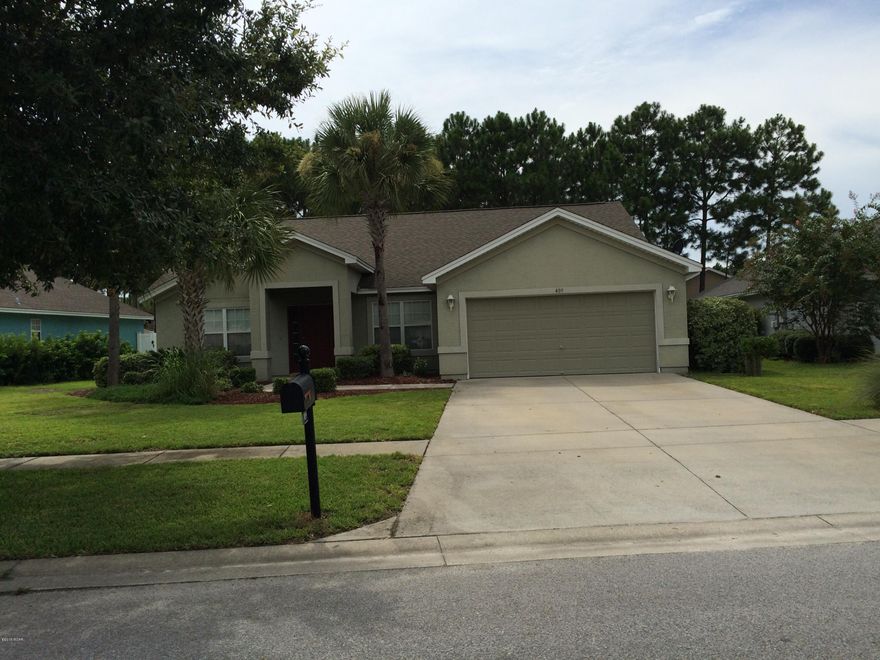 Great Palmetto Trace home - 4 bedroom 2 bath home with a 2 car garage. Palmetto Trace is located just across from Pier Park - close to lots of shopping, dinging and much more. Palmetto Trace features 2 community swimming pools, side walks, street lamps, and close to Frank Brown sports complex.