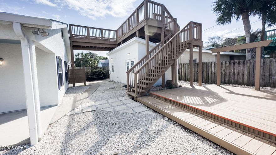 Welcome to your Beach Home .Whether it's for Weekly Rental ,Second Home or Primary Residence this Beach House checks all the boxes .Located in the first block of Bid A Wee Beach ,so only steps to the Coded Beach Access The Dolphin #4. Don't let the age Fool you Extensive remodel and add on in 2010( I have the plans ) Outside was just freshly painted February 2025. Open living room ,dining room and Kitchen with Pass through opening and Bar . Granite Countertops. The Master Bedroom is 17 x 17 with  French  doors opening to a private patio for that morning Coffee. Step into the Master Bath with Jetted Tub Shower Combo .
Guest Bedroom with Bunkbeds ,Second Guest Bedroom with Full Bed . Tankless Hot Water Heater . Outside you will find 2 Storage Buildings .1 you can actually park a golf cart in if needed ..HVAC 2023 .
And for the OH MY Moment  The Deck. Walk Up the Stairs outside to a L shaped Deck ( 11.5 x 9.5 and 11.10 X 15.10 )Yes there is a Gulf View. Bid A Wee Beach has over 2200 Feet of Private Dedicated Beach with 5  coded gates and walkways .
Best Part NO HOA and Weekly Rental Zoned for the Win .