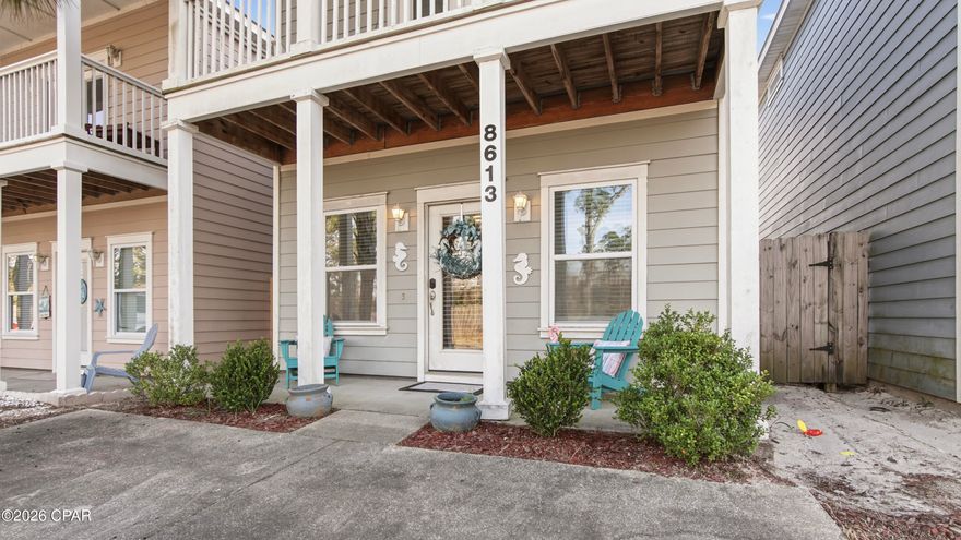 Affordable beach living in Panama City Beach within a gated community offering a community pool and a convenient drive to the beach.
This 3 bedroom, 2.5 bath home features an open kitchen, dining, and living layout designed for easy everyday living. The kitchen includes a center island, backsplash detail, and seamless flow into the main living area - creating a comfortable and functional space to gather.

The primary suite is located on the first floor and offers a double vanity and tiled shower. A door from the suite leads directly to the deck and fenced yard, complete with an outdoor grill area.

Upstairs, two generously sized bedrooms share a full hall bathroom. One of the bedrooms includes two closets and access to a private balcony, adding flexibility and character to the home.
No yard maintenance, gated entry, community pool, and close proximity to the beach make this property ideal as a primary residence, second home, or investment opportunity.