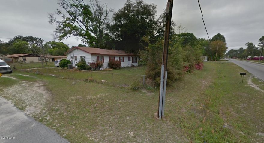 Great investment property! This 3 bedroom house is located on a large fenced yard. The home features hardwood floors and separate dining room. House has alot of potential. Priced to sell, it will NOT last long!