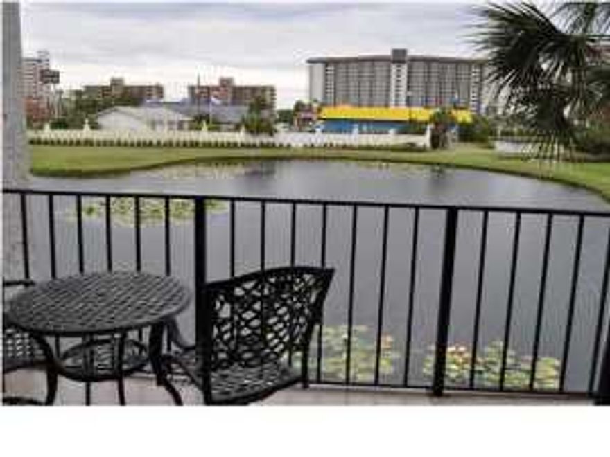 Updated, turn-key townhouse style golf villa in Edgewater Beach & Golf Resort. This two story unit has been beautifully upgraded and nicely furnished. This unit has two balconies, each with a great view of the golf course and water features. Relax by the community pool located by your building, or take a short stroll over the foot bridge to the lagoon pool by the Gulf of Mexico. Like to hit the links? There are 36 holes surrounded by water and sand traps just steps from your front door. If you're into tennis, you'll enjoy the six all-weather Plexicushion tennis courts, with lighted courts for night play. Many restaurants, family style entertainment venues, and much more are within walking distance. Pier Park is a mere 10 minutes drive away! All info is approx and must be verified