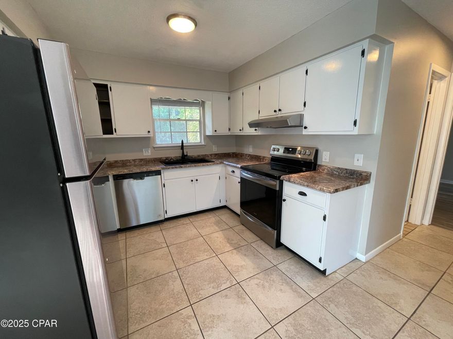 For lease - Centrally located in the heart of Panama City, this duplex was just updated with new vinyl flooring, fresh paint and new stainless appliances. The kitchen includes a refrigerator, stove/oven, dishwasher and hood vent. The open concept living, dining and kitchen gives this unit an expansive feel. Large laundry room inside; The master has a wall-to-wall closet. Additional bedroom with plenty of room for an office set up or 2nd bedroom suite. Large grassy backyard. Lawn service included. *Pets negotiable with $250 pet deposit, $50 pet fee, $25 monthly pet rent.