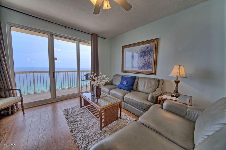 CURRENTLY UNDER CONTRACT, SELLER ACCEPTING BACKUP OFFERS. Highly coveted GULF FRONT MASTER floor plan at Calypso! This 2-bedroom plus bunk room unit boasts the most desirable layout at Calypso, offering plenty of space to maximize rental potential. Selling fully furnished with hardwood and tile floors throughout, this unit is turn-key ready for immediate rental use so you can capitalize on the upcoming peak Spring & Summer seasons. Ideally located walking distance to Pier Park - the area's shopping, dining, and entertainment epicenter - and directly beachfront. Owners and guests enjoy resort-style amenities including 2 large Gulf-front swimming pools (one heated seasonally), a palm tree-studded beachfront patio, a tiki bar during the season, and an exercise room.