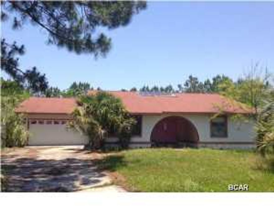 This home is located in the Sandy Creek area and conveys with an extra lot for a grand total of about an acre of land. This is a house that creates an opportunity for the handy man or contractor to work with a blank canvas and create a dream home. There is a huge kitchen and an atrium in the center of the home. The bedrooms are all spacious. There is and open patio and room for pool, RV's, boats.