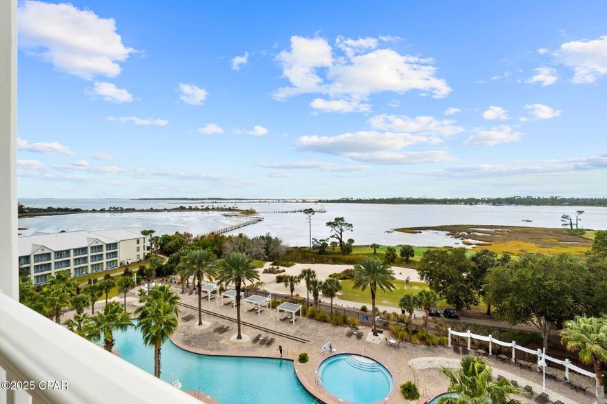 Highly coveted 7th-floor condo in the 6th stack at Reflections at Bay Point Resort offering the best unobstructed views of the inlet, Gulf, and Shell Island. The view alone will have you starting and ending your day on the balcony, drink in hand, in absolute awe. Sold fully furnished and freshly updated with new HVAC, washer/dryer, paint, high-end furniture, artwork, queen sleeper sofa, and custom surfboard patio table. The interior showcases granite countertops, stainless steel appliances, new flooring, and a spacious primary suite with a double vanity and walk-in shower. Enjoy resort style amenities including a lagoon pool, hot tub, spa, and kiddie pool all within the Bay Point community featuring 24-hour security, parks, tennis, and the Jack Nicklaus Golf Course. Perfect as a coastal getaway or investment, this condo also offers the ability to offset ownership costs through short-term rentals, with annual revenue projections of approximately $29,000.