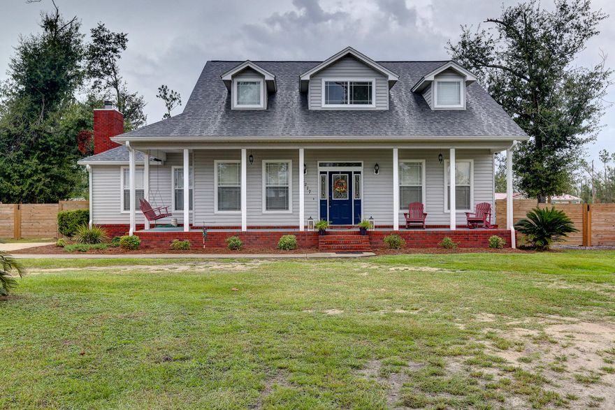 Don't miss out on this beautiful 5 Bedroom, 3.5 Bathroom home that is situated on over an acre, with a pool and a pond! It will feel like home the second you walk through the door. The semi open floor plan makes for a great space to live and entertain. The large kitchen boasts lots of cabinet and counter space to include an island and attached breakfast bar.  Off the kitchen, you will find the formal dining room and spacious family room that features a beautiful stone fireplace. The master suite is located downstairs and offers ample space for over-sized furniture.  The master bathroom features a walk in closet, large tile shower and garden tub, as well as a double vanity. Downstairs you will also find the half bathroom and large utility room. Upstairs you will find 4 bedrooms and two bathrooms, perfect for a large family or for use as guest or office space. Outside you will find a covered patio that leads to the fenced in pool area. This area is another great space to entertain. The large back yard is fenced and has a pond towards the back of the property. There is also a large storage building. Bring your toys, because there is plenty of room to store your boat, camper or other recreational vehicle. This home is just minutes from Harders Park, which has baseball/softball fields as well as soccer fields and playgrounds. Majette Park is also close by and has areas you can fish or play disc golf. Only a short drive from the heart of Panama City and Panama City Beach, the location of this home is hard to beat. Call a Realtor today to schedule your private showing. If important please verify all measurements.