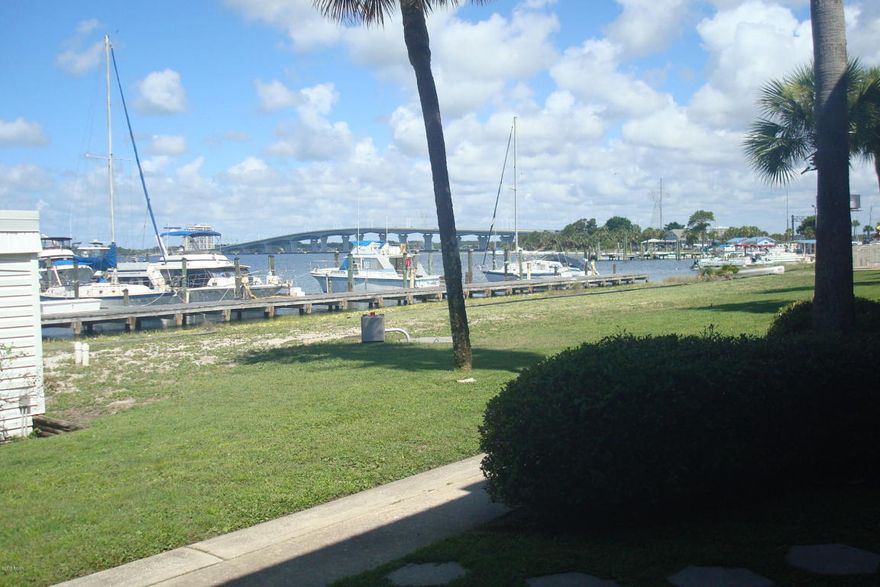 BAY FRONT!Updated waterfront one bedroom fully furnish Sun Harbour Condo overlooking St Andrews Bay. A wonderful place to live if you like boating, swimming and fishing. Walk out the back door into Sun Harbour Marina and the bay. Across the highway from Gulf Coast College. Convenient to shopping, restaurants and the beach. New paint throughout, new carpets and updated kitchen. Unit comes with a washer and dryer and portable air conditioner that has been added to the bedroom. Come look and see for yourself. Please verify measurements and information if important.