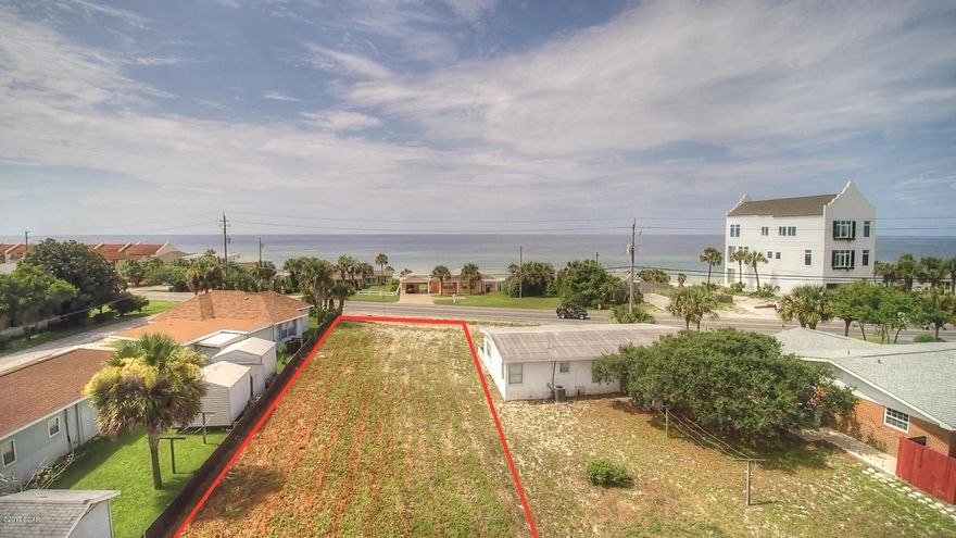 **ZONED SR1** Developer/Builder Special - This 50x150 lot has road frontage at the front AND rear of the lot so you can build a rear load garage or even a second house. The lot is much higher than the land on the gulf side so views would be phenomenal. Currently zoned 15/units per acre with an allowable height limit of 60 feet. 4. No HOA
There are NO HOA fees for this location, you can build what you want, and park where you want without the HOA rules.

5. BUILDING
Located on the North side of Front Beach Road, you are out of the jurisdiction of the FDEP (Florida Department of Environmental Protection) and the USACE (United States Army Corps of Engineers). Exciting, right? It is! You will save money (and time) not having to get special environmental building permits from those organizations.

Also, don't forget that insurance is a completely different ball game on the North side of the road.

(Our red boundary lines are estimates. Please refer to the survey and legal description provided).