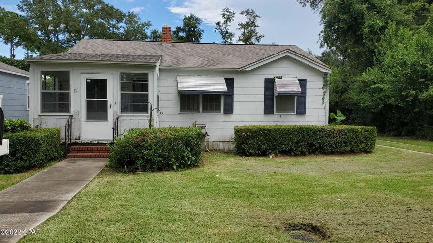 Charming Older Home in Marianna.  This 3/1 home is located close to Chipola College and Jackson Hospital.  This home has a newer roof and a 12X20 Workshop with electricity.  Living and Dining room have hardwood floors.  Additional room was added to give more space for your kitchen and pantry.  Large Laundry room for extra storage space.  This home needs a little TLC to make it your own.  Call today to see the possibilities this home offers.