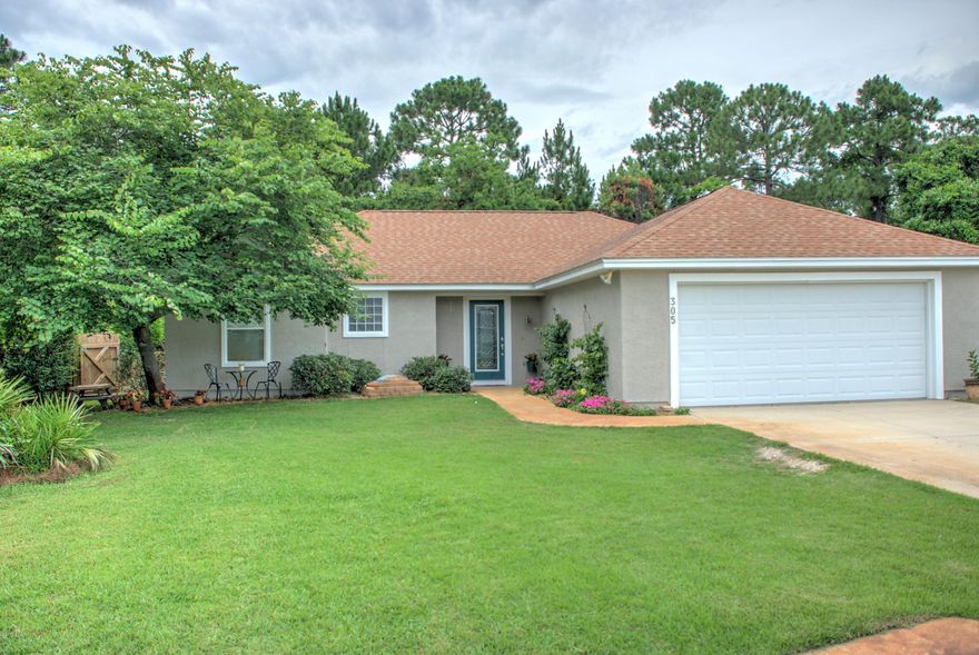 This beautiful home in Hidden Pines Neighborhood boasts vaulted ceilings, open floor plan, updated kitchen, split bedrooms, large master and walk in closet, private and gated backyard, 2 car garage, and on a quiet cul-de-sac street. New water heater 3 years ago. Freshly painted exterior with large front yard. A preserve behind the home gives complete privacy and tranquil scenery. Located 5 houses away from the paved bike path that leads to Patrons Elementary. (.2 miles from your front door!) 1.8 miles to NSA, 5 minutes to the beach, 10 minutes to pier park and 25 minutes to the airport. Great location with amazing rental potential for $1600/month! It's a must see!