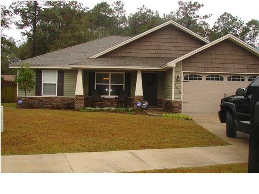 This 3 bedroom, 2 bath home features a split bedroom floor plan, an office, wood cabinets, stainless steel appliances, tile flooring, a double car garage and so much more. The home also has a fenced in backyard with an extended patio, perfect for enjoying the the warm Florida summers.