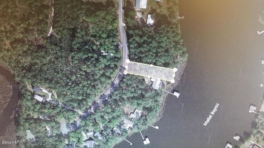 Great waterfront lot on Mallet Bayou with good water for your boat. Nice deep lot that is just waiting for your perfect beach house or primary residence in an area that is perfectly situated between Freeport and the Beaches of South Walton off Hwy 331