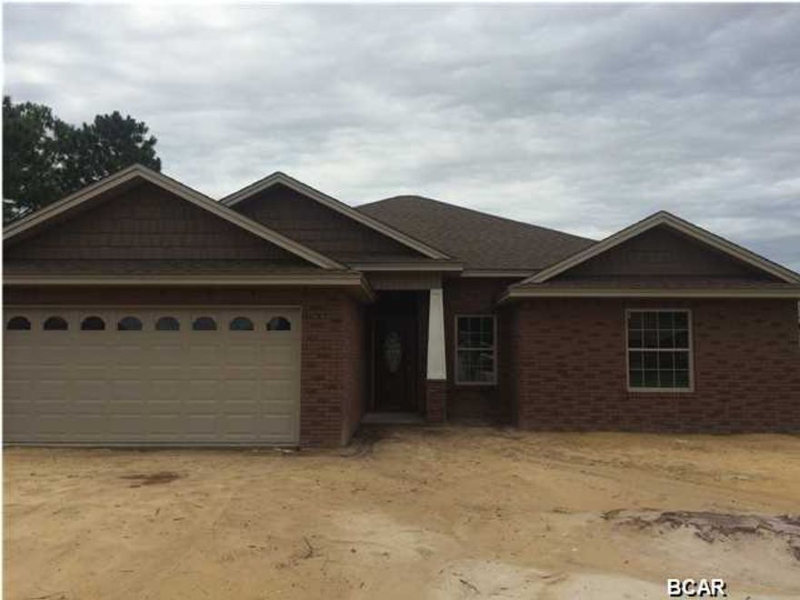 New construction brick home in Cedar's Crossing offering easy access to TAFB and Panama City's major shopping and dining corridor. Interior of home offers kitchen with custom stained Maple cabinets and Living Stone Countertops, large volume living room with wood laminate flooring, master suite with box ceiling, double vanity, separate shower and tub, two walk-in closets, dining room with box ceiling, 4th bedroom/office, oil rubbed bronze fixtures. Exterior features fully sodded yard with timed sprinkler system, two car garage with opener, 8x11 covered back porch, underground utilities and sidewalk. Click photo for additional pics, home's website and virtual tour. All ages, sizes, and school zones are approximate and are subject to change.