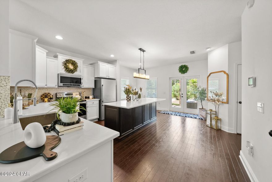 Back on the market! No fault to the seller!! This beautiful two-story, 3-bedroom, 2.5-bath home in the quiet community of Harstvedt Plantation offers easy access to nearby 30A beaches, shopping, dining, and the bay.

The home features a classic brick exterior and many designer upgrades, including dark hardwood floors, a custom backsplash, and quartz countertops with a custom island in the kitchen. French doors lead out to a beautiful paver patio with a pergola, perfect for outdoor entertaining.

Additional features include interior plantation shutters, bronzed hardware, exterior wooden shutters, a new irrigation system and sod, a smart thermostat, a security system, and a second-floor laundry room.

Truly gorgeous and a must see! Call for your private tour today!