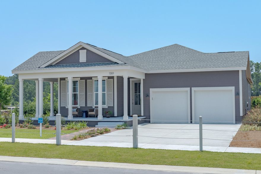 This house is a new construction Model Home Example and not the actual house being built. SB home shown has custom and optional features. Please ask agent for standard feature list. This home features the Anna Maria floor plan with a Boatbuilder Elevation.