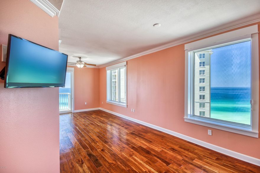 Gorgeous 3 bedroom, 3 bathroom at Grand Panama Beach Resort in Panama City Beach, Florida! Glorious views present themselves from all angles of this impressively remodeled condo that has never been rented. Current owners did a wonderful job renovating this property that would make a perfect primary, second or vacation rental property along Florida's spectacular Emerald Coast. The 11th floor height is perfect to open all of the corridors to the east and west allowing for significant views from all bedrooms. Grand Panama is a great resort featuring multiple pools, fitness center, tiki bar and one of the best beach front areas you'll find. The property is centrally located near Pier Park as well as all things Panama City Beach nearer the Thomas Drive corridor. Come see this condo today!