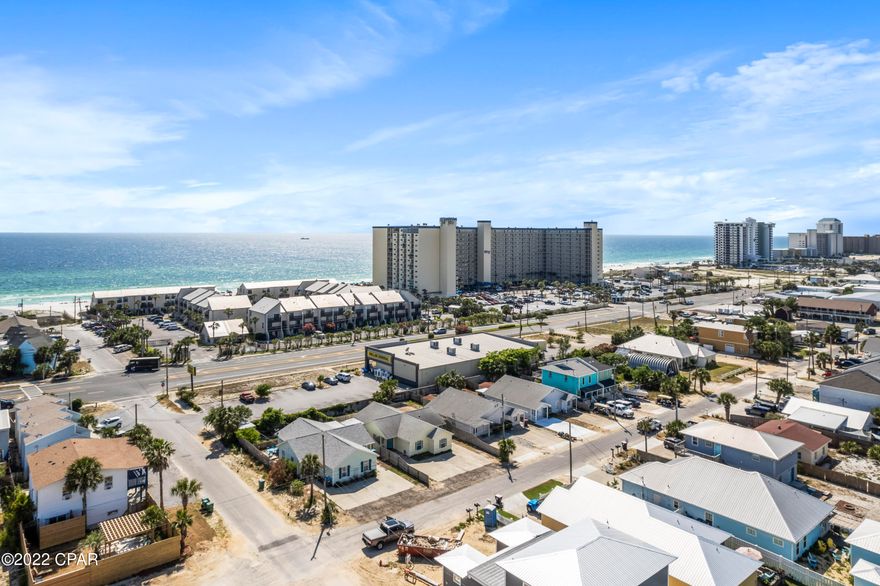 CURRENTLY UNDER CONTRACT, SELLER ACCEPTING BACKUP OFFERS. DUPLEX ONE BLOCK FROM THE BEACH! This charming investment property is in a prime location, just steps from the sugar white sands of Panama City Beach. Each side of this duplex offers a coastal, serene design with two bedrooms and one bath that is turn-key. Enjoy the oversized backyard after a long day at the beach and watch incredible sunsets or play yard games under the stars. Rent each unit separately to maximize the rental potential with this duplex! Or live in one side and enjoy the beach life while you rent the other side for additional income. The possibilities are endless with this location! The units already have rentals on the books for 2022 and reservations being made daily! Buyer to verify all dimensions and information.