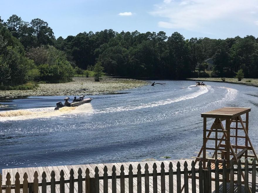 FREE Home Warranty with acceptable contract! You've found your happy place in this 4 bed/ 2.5 bath home on the Water with direct access to Deerpoint Lake! You must see this house to appreciate it! 

Home features:Large Deck Space; Private Dock; Metal Roof; Main Level Master bedroom with Water view and deck access; Open Floor plan, Granite Counter tops, Stainless Appliances, Pantry, Kitchen Island; Wood Look Tile; Guest Bath and Spacious Laundry Room both on main level; 

On 2nd level you'll find: Additional Family Room, a Private Bonus Space with Beautiful Waterviews that could be an office/man cave or additional bedroom, a full bath and 3 more bedrooms! With quick access to town, this quaint neighborhood is the perfect place to raise your family and enjoy affordable waterfront living!