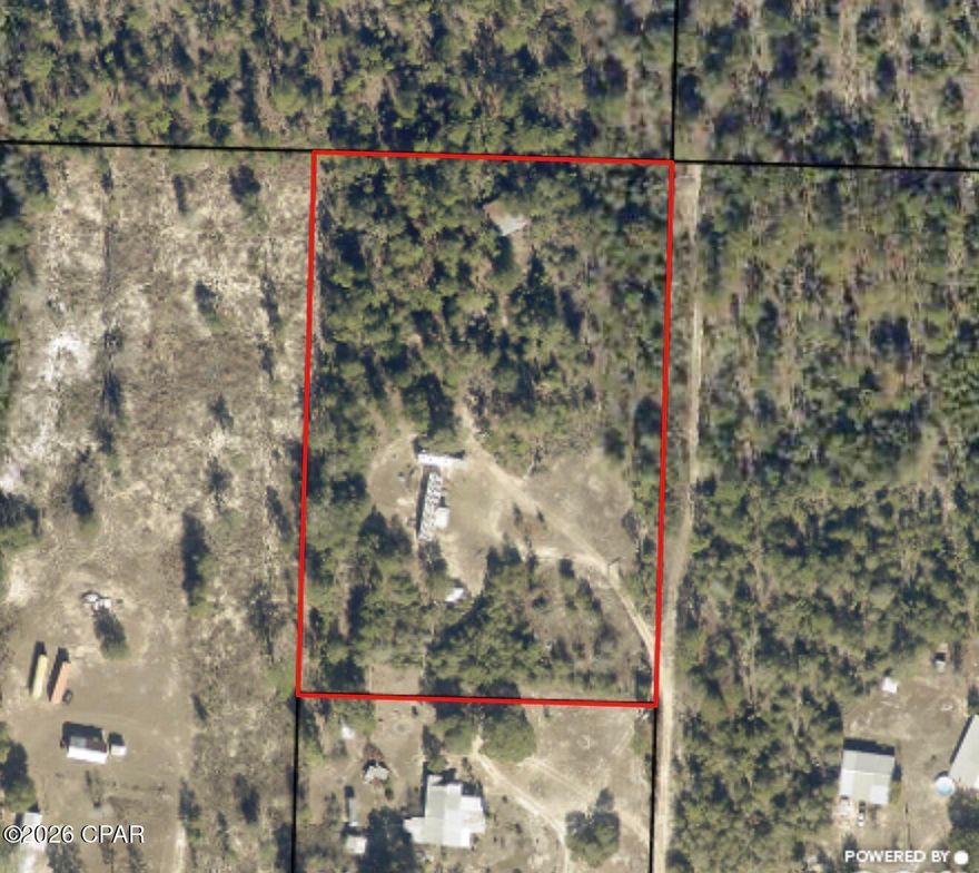 Sitting on just shy of 4 acres, this property is full of potential and ready to be transformed into your new home! The enclosed pole barn offers plenty of space for a workshop, storage, or hobby area. The property already features a well, functional septic system, and power connection in place. The manufactured home is being given no value and will require significant renovation or removal, giving you the opportunity to create the property exactly how you envision it.