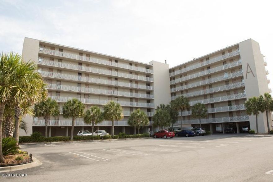 Amazing 2 bedroom/2 bath unit has been beautifully tiled and comes fully furnished! This unit is move in/rental ready. Gorgeous gulf front living room, private balcony, 2nd bedroom has 2 double beds. The master bedroom is gulf front and has a large window with great sunset views. Comes with a covered parking stall. Dunes of Panama amenities include...pools, dedicated beach, tennis courts and more! All info is believed to be correct, please verify if important.