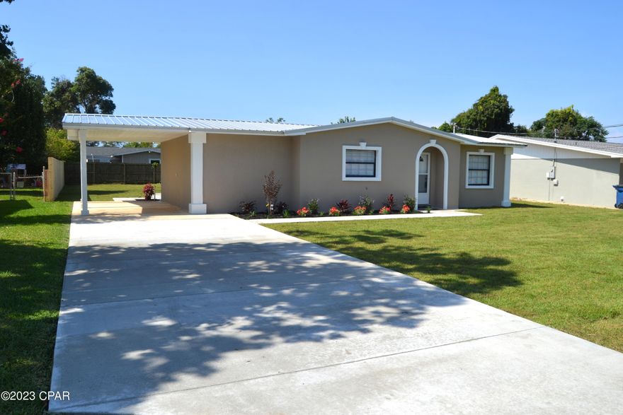 CURRENTLY UNDER CONTRACT, SELLER WILL CONSIDER BACKUP OFFERS.    DRASTICALLY REDUCED!!!   LOCATION LOCATION LOCATION.  The COVE is the place to be!  Come see this well done, completely renovated 3 bedroom, 2 bath home located in one of the most popular neighborhoods in Bay County.  The interior and exterior have been very nicely redone and need nothing except for a new owner.   It will qualify for all financing easily so rest assured that YOU can own this home.  The kitchen is brand new with new cabinets, counter tops and a really nice stainless steel appliance package.  A breakfast bar separates the kitchen from the dining area.  Just off the dining room is a large den, office or extra room for a possible bedroom.  The living room is spacious enough for the largest of furniture. All 3 bedrooms are  large with a nice layout.  Both bathrooms are also brand new.   There is an oversized one car garage with a 340 sq foot finished, heated and cooled room that could be used for more living space, game room, office and would be easy to turn into a complete apartment.  Outside, there is a fresh concrete drive, car port AND a nice concrete patio just off of the dining room.  If you are thinking of buying in the Cove area, you owe it to yourself to see this home.  Get in the neighborhood while you can!