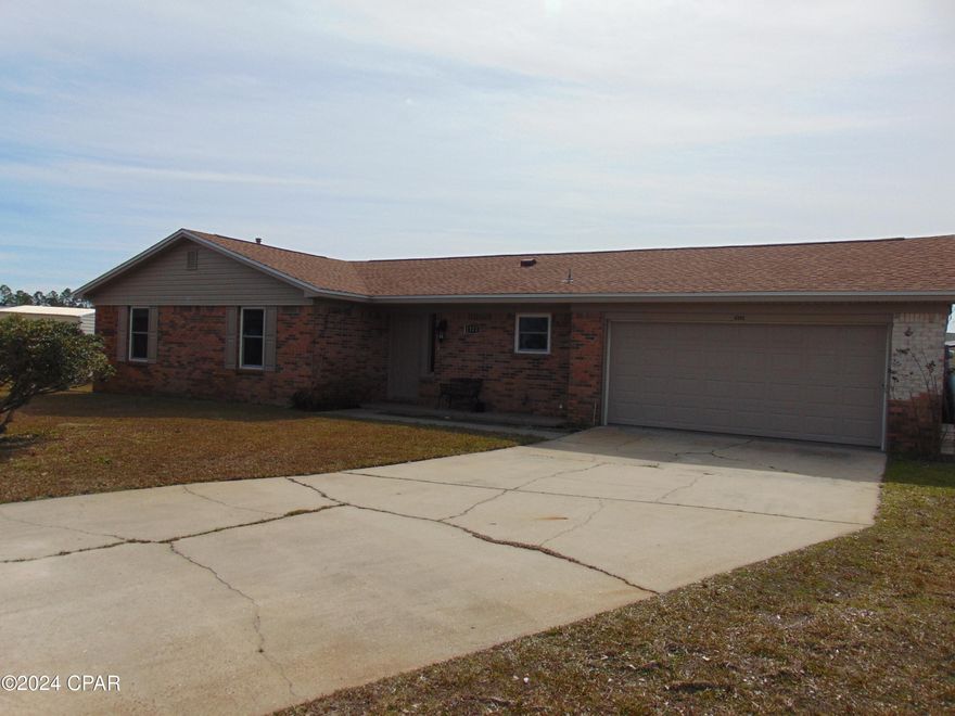 Owner Finance Available!!  This is a beautifully updated home with three bedrooms and two baths. It sits on a large lot that is located on a dead-end cul-de-sac. Its' central location is in Callaway and Tyndall Air Force Base is mere minutes away. The large third of an acre yard has a double gate on one side and a single wide gate on the other side. The totally fenced-in back yard also has a 12 x 24 fully foam insulated storage building with electricity. It has another older 8 x 12 shed that needs a little TLC but has great bones. A separate power pole is located on the double gate side of the yard for possible future pool, RV hook-up, permitted building, etc.  A new roof, hurricane proof windows, duct work and vinyl soffit facia and gabled ends (no future painting required) were installed in 2019/2020 after Hurricane Michael. This home also has a separate working well, which the front yard sprinkler system uses as a water source. The garage has plywood walls installed on the right side of garage and has been repainted from top to bottom, including the floor. A brand-new natural gas water heater is also located in the garage as well as washer/dryer hookup. Inside you will find new custom cabinets which include two lazy Susan lower corner cabinets and a nice size pantry. The kitchen comes with a side-by-side refrigerator, dishwasher, self-cleaning over, and over the oven microwave. New paint, vinyl plank flooring, lights and/or ceiling fans have been installed throughout the home. Bathrooms have been completely remodeled with new vanities, toilets, faucets, and tub/shower surrounds. The great room offers a beamed ceiling and a wood burning fireplace. A tiled Florida room with a Jacuzzi finishes off this lovely home. A ductless split AC/heater is on schedule for installation in Florida room. The central air conditioner and natural gas heating unit was installed in 2017. It is serviced and maintained by Peaden Air Conditioning Service. Great closet space with a coat closet at the entrance, two hall closets, a closet in the hall bath and a walk-in closet in the master bedroom. Updated pull doors have been added to bedroom two and bedroom three closets. A nice patio is located off Florida room and garage. This house is a must see and move-in ready. Close to Tyndall AFB, shopping and restaurants.