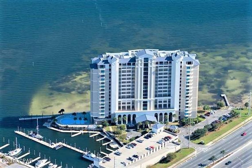 Look no further, this is the full time residence or second home you've always dreamed of... professionally decorated and well-appointed and without a doubt the very best views at Marina Landing! Marina Landing features floor to ceiling views of the pristine St. Andrews Bay from every room and the expansive balcony features a stainless outdoor kitchen that provides you with a true outdoor living space that is perfect for entertaining family and friends. The Chef Inspired kitchen features an abundance of cabinetry, granite throughout, decorator designed breakfast bar, new stainless steel appliances and full pantry. The Master Bedroom Suite comes with full walk-in closet, luxury master bath with separate shower and extra deep soaking tub great for those bubble baths! This spectacular property has a private deep water marina onsite and is just minutes to the Gulf ...a boat owners dream come true. Marina Landing also features a beautiful bay front pool and hot tub with tropical landscaping, quiet sitting areas, conference room, and health & fitness center. Just minutes to the white sandy beaches and right down the street from Pier Park, this spectacular property provides both the perfect location and the perfect lifestyle... If you are looking for the perfect place, you owe it to yourself to take a look, this one will not last long!