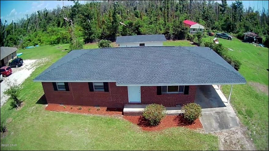 Beautifully updated home that is move in ready. As you enter the house through the covered carport the totally remodeled white kitchen cabinets and appliances jumps out at you. The vinyl plank flooring flows through out the house seamlessly. The warm freshly painted walls will match any furniture décor. Enjoy the soft comfortable feel of carpet in the morning as you get out of bed, all three bedrooms have new carpet. The master bedroom has it's own totally renovated bathroom with a full tub/shower to relax in after a long day. Plenty of natural light through the house complemented with new 2'' blind window treatments. The large living room has plenty of space for seating and home entertainment as well as an over sized coat closet next to the new front door. The utility room has plenty of space for your washer, dryer, storage and a pantry. Exit through the utility room door to the back yard and detached 1 car garage with new roll up door. Appreciate the comfortable room temperature throughout the house with the new high efficiency air conditioner, duct work and ceiling fans. With today's low interest rates and the new Hurricane Michael relief fund now is probably the best time to buy ever. Contact your favorite Real Estate agent today to see this unbelievable home.***The purpose of this sale is to accomplish a 1031 Exchange.***