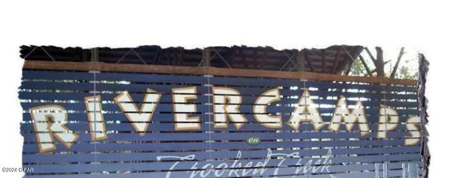 All info and sizes are apx--taken from tax records---//PRICE CHANGE//// REDUCED--SELLER READY TO SELL////Super Neighborhood near Panama City Beach, Airport and other neighborhoods like Margaritaville, Breakfast point, Caroline Beach, 30-A---very desired area to build your ''DREAM HOME''---Seller's has a Custom set of Floor Plan's for a new home that would convey with this lot--(would save you lots of time and money, if you like)  Call for list of all amenities--Swimming pool, dry boat storage, hiking trails, biking and beautiful environment (loads of wildlife)-boat landing  
on crooked creek that leads into intracoastal waterway, West Bay and Gulf of Mexico!  Only 10 minutes from the Gulf and the pristine white sand.  Buy now and build for relaxation and retirement!!!Seller purchased another home on water and decided to sell--Motivated--make offer--and start building your dream!!BIG TIME REDUCED!!