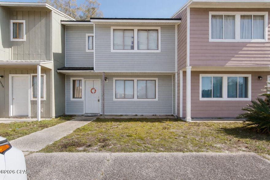 This spacious 3-bedroom, 2.5-bath townhouse is centrally located and designed for comfortable everyday living. The first floor features an open great room, dining area, and a fully equipped kitchen, along with a convenient half bath. Upstairs you'll find the primary bedroom with an en-suite bath, two additional guest bedrooms, and a full bathroom.

Additional features include a dedicated laundry room, covered back patio, and a fenced backyard, ideal for relaxing or entertaining. The property is located in a quiet, peaceful neighborhood close to shopping, parks, restaurants, hospitals, and schools. Just a short drive to Panama City Beach and Tyndall Air Force Base.