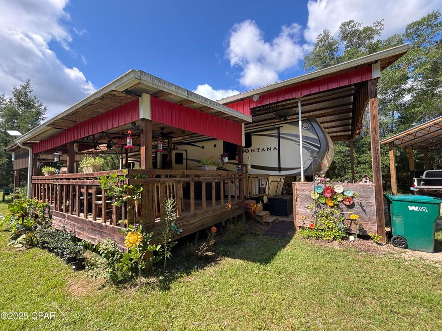 12.5 Acres of Versatile Rural Paradise
Discover your dream retreat on this expansive 12.5-acre property in the heart of Caryville, FL! Perfect for those seeking a blend of rural serenity and modern functionality, this land offers endless possibilities for outdoor enthusiasts, hobbyists, or anyone looking to build their forever home.
Property Highlights:
•  Spacious 12.5 Acres: Plenty of room for recreation, farming, or future development, with a mix of open and wooded areas.
•  30x60 Pole Barn with RV Amenities: Custom-built for RV living, featuring a sturdy deck and dedicated cooking area, ideal for entertaining or a comfortable outdoor lifestyle.
•  24x24 Pole Barn with Car Lift: A mechanic's dream! Includes a car lift, built on an 8 inch thick concrete slab with robust 8x8 poles for durability.
•  Existing Infrastructure: Fully equipped with a septic system, well, and propane, saving you time and expense for immediate use or future builds.
•  Prime Location: Nestled in peaceful Caryville, offering privacy yet convenient access to local amenities and major routes.
Whether you're envisioning a weekend getaway, a full-time residence, or a workshop haven, this property is ready to bring your vision to life. Don't miss out on this rare opportunity to own a well-equipped, versatile piece of Florida countryside!