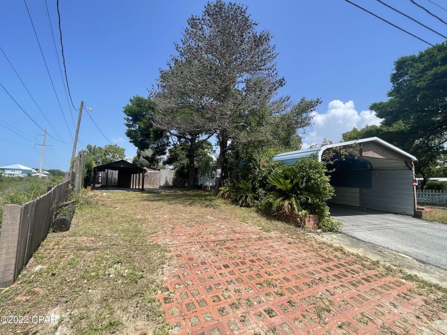 CURRENTLY UNDER CONTRACT, SELLER WILL CONCIDER BACKUP OFFERS!

Great investment opportunity on the beach under $200,000! Home needs TLC, BUT in the right hands can be an amazing rental opportunity just minutes away from the beach, shopping, restaurants and more! Multiple shops/sheds on the property can be used in so many different ways, above ground pool that can be brought back to life with wooden deck all around! Call listing agent for more information!