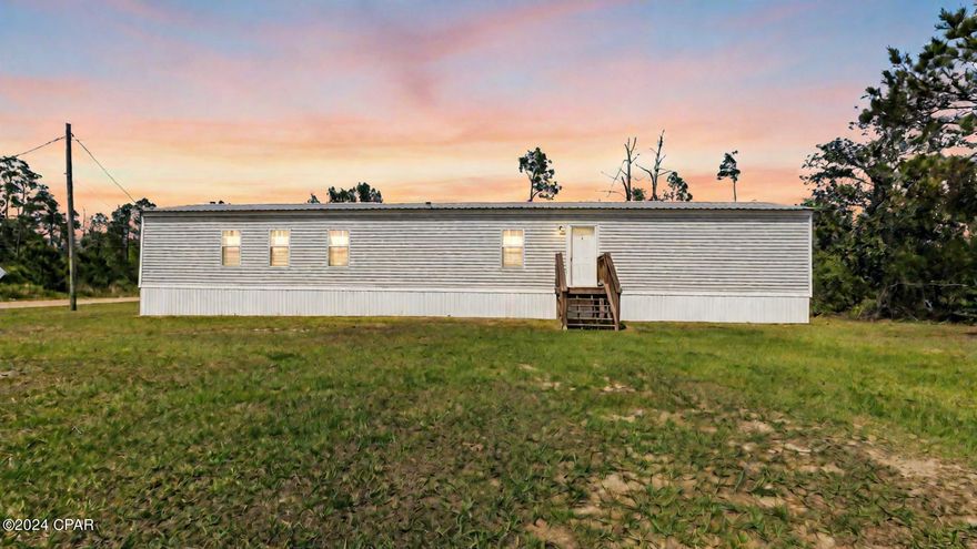 Step into the serene and peaceful tranquility of 11901 Magnolia Street, nestled in the quiet haven of Fountain, FL away from the hustle and bustle of the city! This delightful 3-bedroom, 2-bathroom abode beckons with its timeless charm. Venture inside to discover a bright and airy living space, adorned with abundant natural light, ideal for unwinding after a busy day.

The kitchen exudes warmth and functionality, boasting generous cabinet spaces and a cozy breakfast bar perfect for casual dining moments. Retreat to the master suite, where a luxurious en-suite bathroom awaits, complete with a rejuvenating walk-in shower and dual sinks.

Outside, a sprawling backyard invites you to indulge in your favorite outdoor pastimes, offering ample space for relaxation and recreation alike as it's situated in a peaceful neighborhood.

Don't let this opportunity slip through your fingers! Embark on the journey to make this haven your future home. Reach out to us today to arrange a private viewing and seize the chance to embrace a life of serenity and splendor!